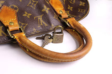LOUIS VUITTON Alma monogram canvas bag