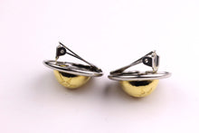 CELINE PARIS logo globe stars earrings