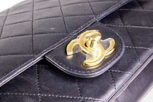 CHANEL classic 11.12 double flap black leather bag