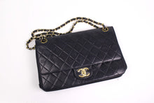 CHANEL classic 11.12 double flap black leather bag