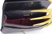 CHANEL classic 11.12 double flap black leather bag