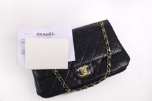CHANEL classic 11.12 double flap black leather bag