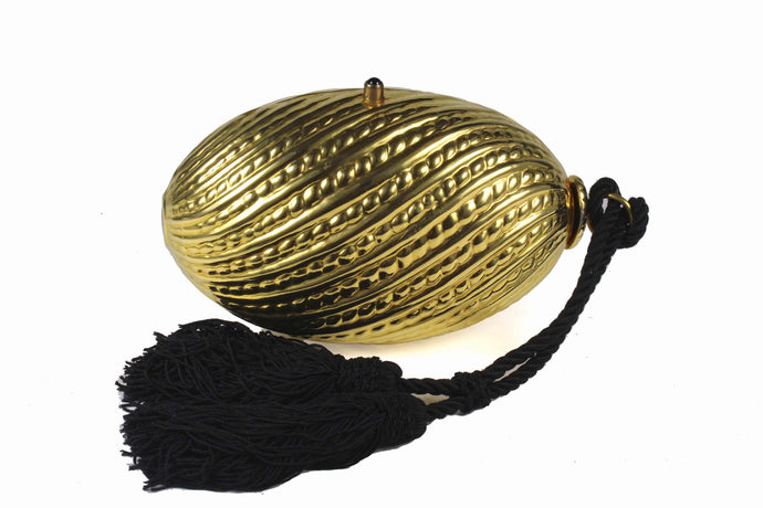 Golden egg clutch with wrist double tassel