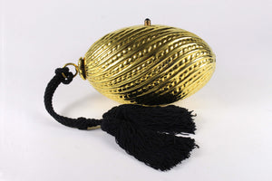 Golden egg clutch with wrist double tassel