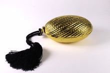 Golden egg clutch with wrist double tassel