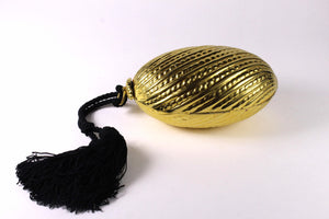 Golden egg clutch with wrist double tassel
