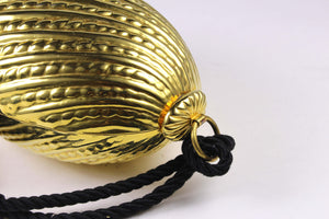 Golden egg clutch with wrist double tassel
