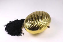 Golden egg clutch with wrist double tassel