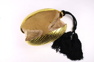 Golden egg clutch with wrist double tassel