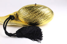 Golden egg clutch with wrist double tassel