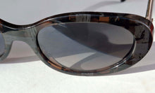 CHANEL oval tweed chaine sunglasses
