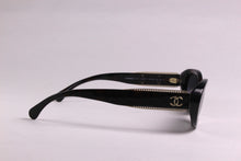 CHANEL oval tweed chaine sunglasses