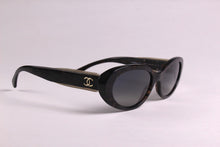 CHANEL oval tweed chaine sunglasses