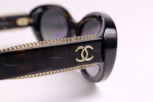 CHANEL oval tweed chaine sunglasses