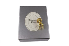 CHRISTIAN DIOR gold plated chair pin