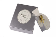 CHRISTIAN DIOR gold plated chair pin