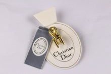 CHRISTIAN DIOR gold plated chair pin