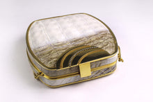 Cream & taupe "sauvage" crocodile skin metal-hard sided clutch