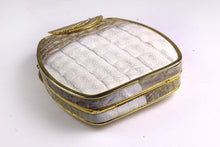 Cream & taupe "sauvage" crocodile skin metal-hard sided clutch