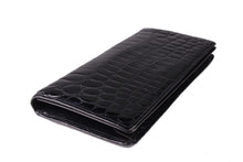 Black crocodile skin pochette