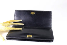 Black crocodile skin pochette