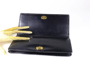 Black crocodile skin pochette