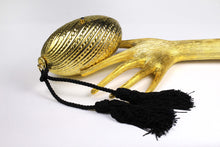Golden egg clutch with wrist double tassel