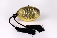 Golden egg clutch with wrist double tassel