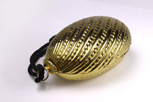 Golden egg clutch with wrist double tassel