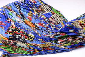 HERMÈS pleated "plissé" scarf “Kachinas” by Kermit Oliver