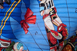 HERMÈS pleated "plissé" scarf “Kachinas” by Kermit Oliver