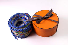 HERMÈS pleated "plissé" scarf “Kachinas” by Kermit Oliver