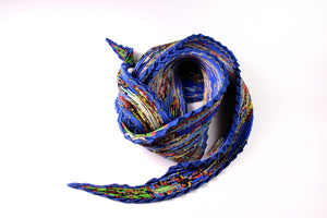 HERMÈS pleated "plissé" scarf “Kachinas” by Kermit Oliver
