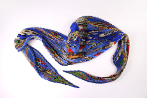 HERMÈS pleated "plissé" scarf “Kachinas” by Kermit Oliver
