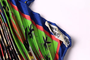 HERMÈS pleated "plissé" scarf “Kachinas” by Kermit Oliver