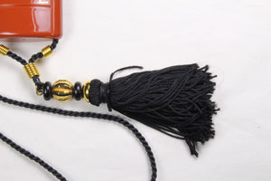 YVES SAINT LAURENT Opium perfume pendant