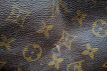 LOUIS VUITTON Keepall 55 monogram canvas travel bag