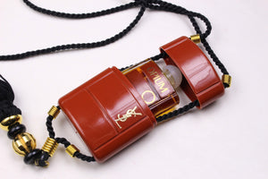 YVES SAINT LAURENT Opium perfume pendant