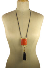 YVES SAINT LAURENT Opium perfume pendant