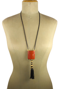 YVES SAINT LAURENT Opium perfume pendant