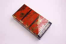 YVES SAINT LAURENT Opium perfume pendant
