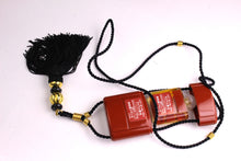 YVES SAINT LAURENT Opium perfume pendant