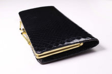 Rectangular black snakeskin clutch purse