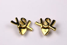 YVES SAINT LAURENT initials over heart earrings