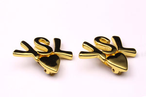 YVES SAINT LAURENT initials over heart earrings