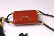 YVES SAINT LAURENT Opium perfume pendant
