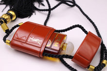 YVES SAINT LAURENT Opium perfume pendant