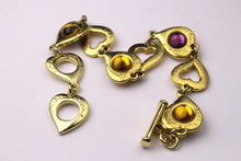 YVES SAINT LAURENT hearts cabochons link bracelet