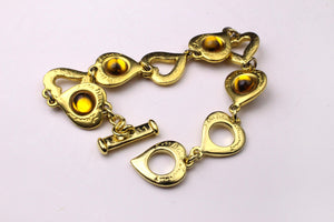 YVES SAINT LAURENT hearts cabochons link bracelet