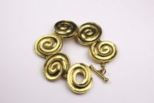 YVES SAINT LAURENT spiral oval medallions bracelet